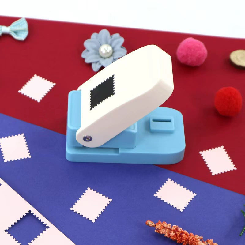 Stamp edge cutter creating decorative paper cutouts