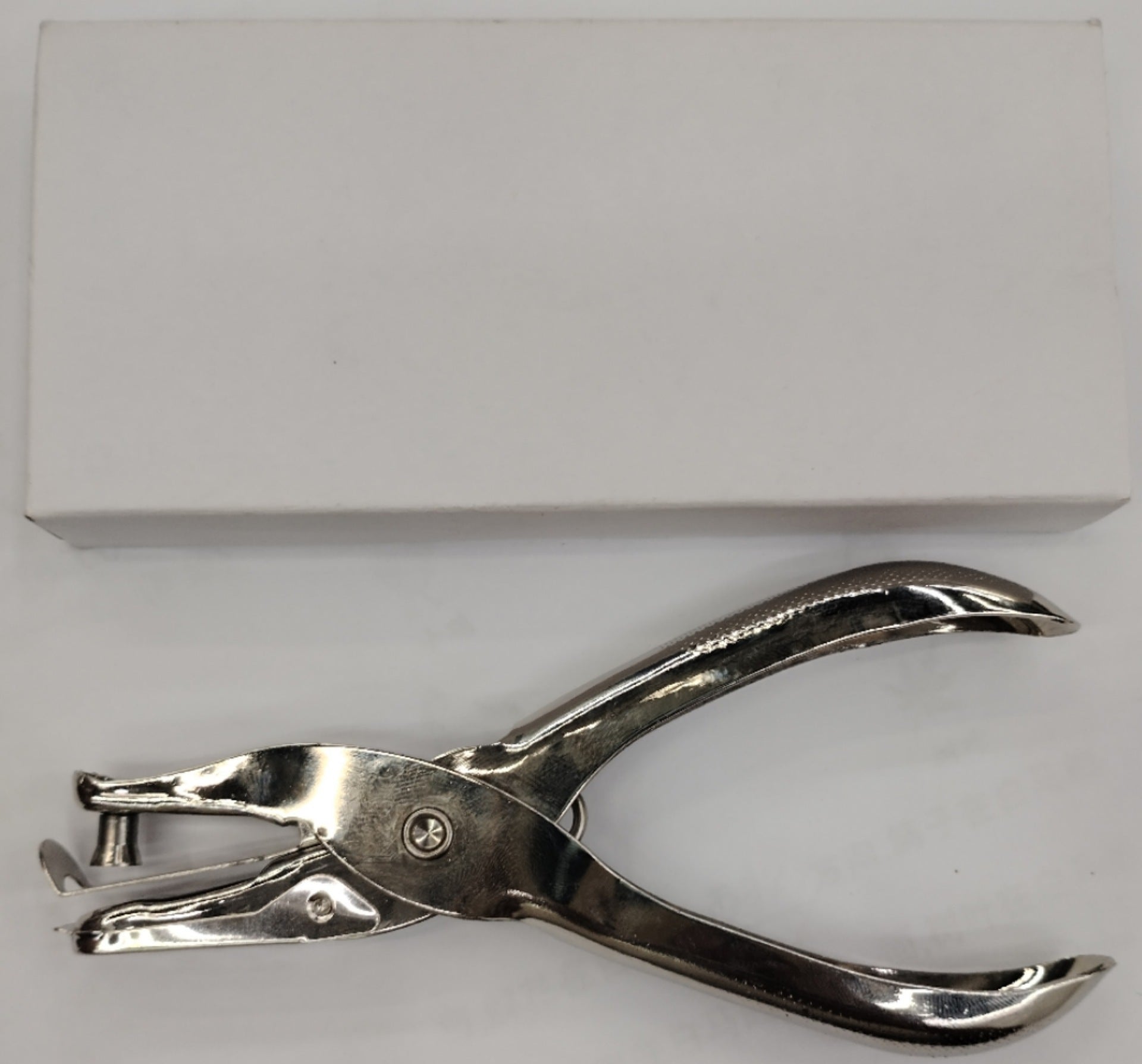 Hand Held Hole Punching Plier