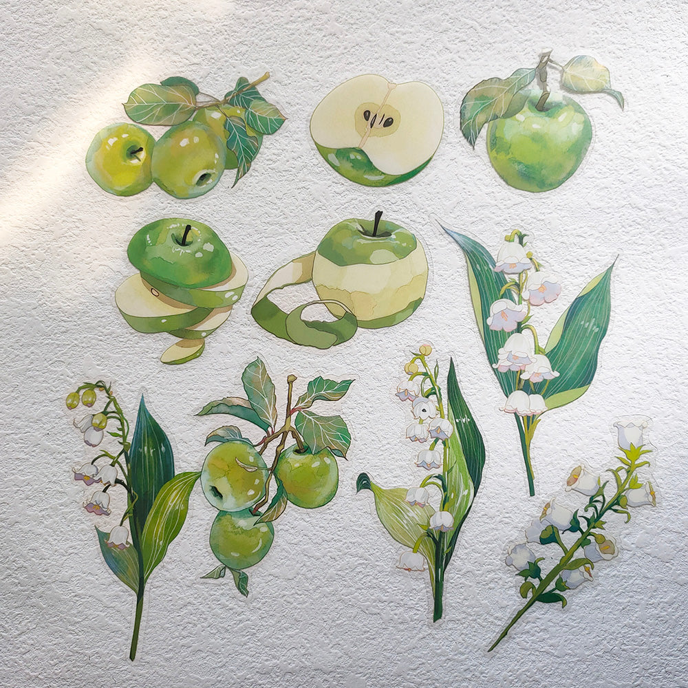 green apple fruit stickers and white flower stickers