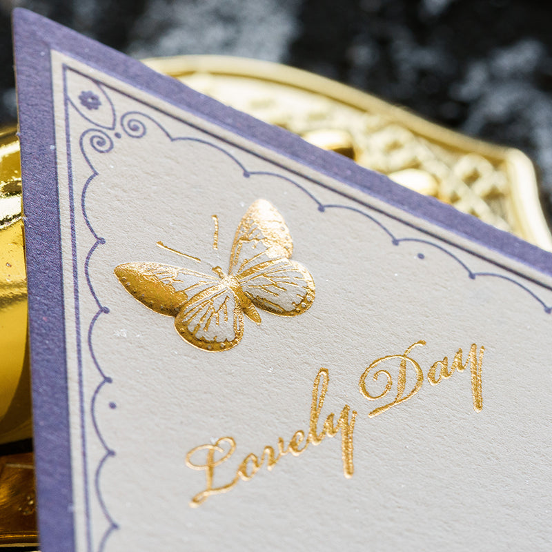 gold embossed butterfly scrapbook paper