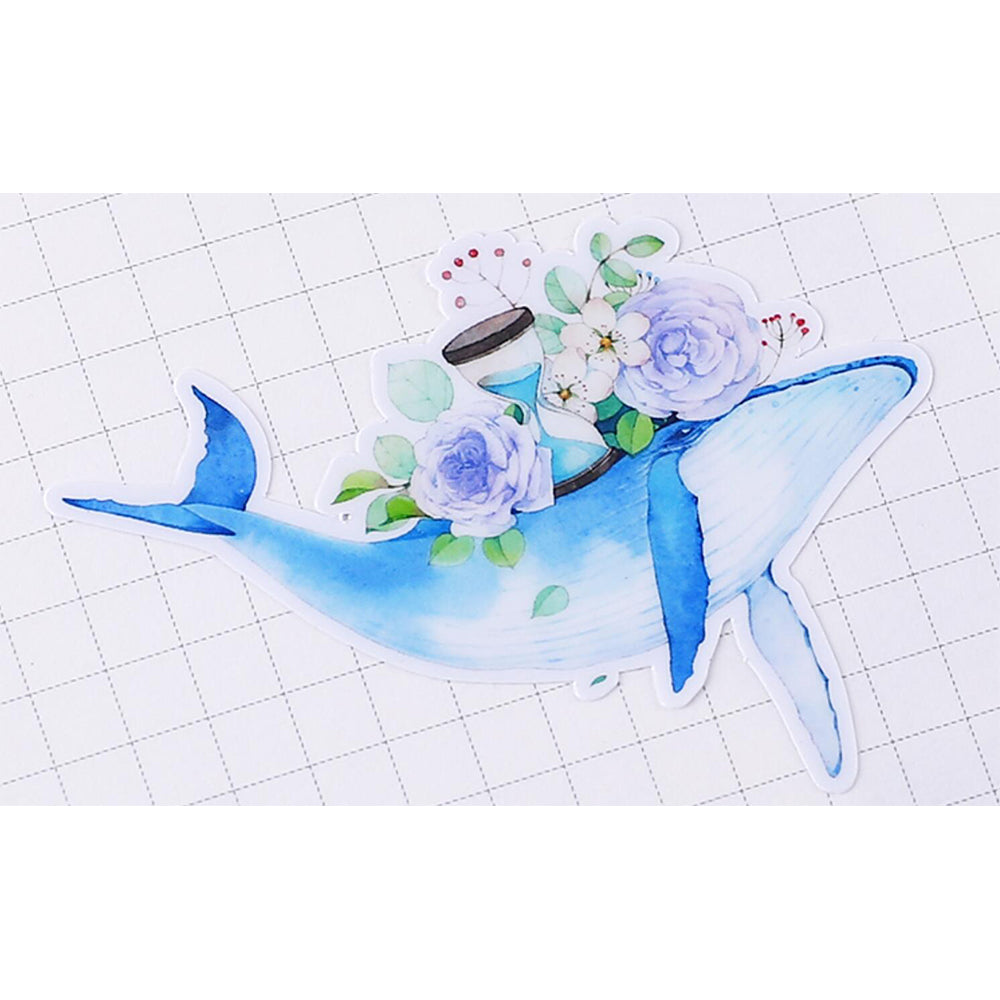 blue whale sticker on white paper